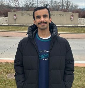 person standing and smiling