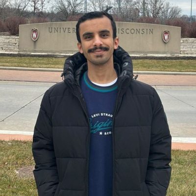 person standing and smiling