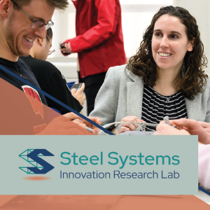 Hannah helping an excited student with a steel model project